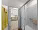 Bathroom featuring a tiled walk-in shower and walk-in closet at 8814 Tuscany Isles Dr, Punta Gorda, FL 33950