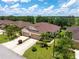 Lovely home with a two-car garage, appealing landscaping, and a neatly maintained front yard at 8814 Tuscany Isles Dr, Punta Gorda, FL 33950