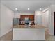Well-equipped kitchen with stainless steel appliances, granite countertops, and ample cabinet space at 8814 Tuscany Isles Dr, Punta Gorda, FL 33950