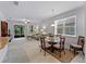 Bright living and dining area offering carpet, natural light and contemporary décor at 8814 Tuscany Isles Dr, Punta Gorda, FL 33950