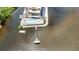 Stunning aerial view of a waterfront property with a boat dock, pool, and lush landscaping at 900 E Marion Ave # 1403, Punta Gorda, FL 33950