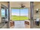 Inviting balcony with wicker chairs, offering a serene space to enjoy nature views at 900 E Marion Ave # 1403, Punta Gorda, FL 33950