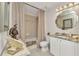 Bathroom featuring a vanity, shower/tub, and decorative accents at 900 E Marion Ave # 1403, Punta Gorda, FL 33950