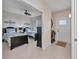 Bedroom featuring two twin beds, dark furniture, ceiling fan, and natural lighting at 900 E Marion Ave # 1403, Punta Gorda, FL 33950