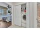 Convenient laundry area with modern washer and dryer near a bedroom at 900 E Marion Ave # 1403, Punta Gorda, FL 33950