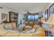 Comfortable living room with stylish furnishings and sliding glass doors offering picturesque views at 900 E Marion Ave # 1403, Punta Gorda, FL 33950