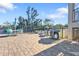 Outdoor grilling area with a dining set, perfect for hosting barbecues in a relaxed and inviting setting at 900 E Marion Ave # 1403, Punta Gorda, FL 33950