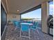 Charming patio area with comfortable seating and a grill, ideal for outdoor dining with a picturesque view at 900 E Marion Ave # 1403, Punta Gorda, FL 33950