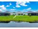 Backyard of home overlooking pond on golf course at 14846 Contenta Loop, Bradenton, FL 34211