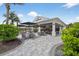 The Bahama Bar has outdoor seating on a brick patio with greenery surrounding the area at 14846 Contenta Loop, Bradenton, FL 34211