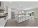 Spacious kitchen with stainless steel appliances, a large island, and lots of cabinet space at 14846 Contenta Loop, Bradenton, FL 34211