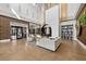 Expansive lobby with high ceilings, stylish seating, and an Olive & Vine sign visible at 14846 Contenta Loop, Bradenton, FL 34211