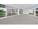 Covered patio offering seamless indoor-outdoor living, with sliding glass doors to the great room and kitchen at 14846 Contenta Loop, Bradenton, FL 34211