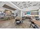 Spacious restaurant with a neutral palette, abundant seating, and modern decor, for an upscale experience at 14846 Contenta Loop, Bradenton, FL 34211