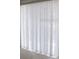 Vertical blind covering a window to allow light into the room at 429 Cerromar Ln # 353, Venice, FL 34293