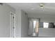 Open-concept living area with neutral paint and views to the kitchen at 429 Cerromar Ln # 353, Venice, FL 34293