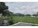Enjoy the scenic view of lush greenery through a screened window, bringing the outdoors in at 429 Cerromar Ln # 353, Venice, FL 34293