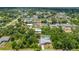 Sprawling property with a pool and lush landscaping in a quiet, residential neighborhood at 732 Haleybury St, Port Charlotte, FL 33948