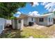Back of home with utility shed and updated cooling unit at 732 Haleybury St, Port Charlotte, FL 33948