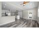 Bright open concept living room leading to kitchen and outdoor patio at 732 Haleybury St, Port Charlotte, FL 33948