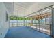 Enclosed patio with view of a pergola at 732 Haleybury St, Port Charlotte, FL 33948