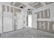Spacious room featuring drywall and multiple doors, ready for customization and finishing touches at 7696 Plantation Cir, Bradenton, FL 34201