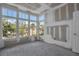 Sun room is unfinished and features large windows offering great views at 7696 Plantation Cir, Bradenton, FL 34201