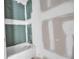 Unfinished bathroom with tub and drywall awaiting fixtures and finishes at 7696 Plantation Cir, Bradenton, FL 34201