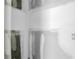 Close-up of a wall under renovation with visible drywall and electrical outlet at 7696 Plantation Cir, Bradenton, FL 34201
