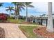 Nicely landscaped backyard and patio overlooking the serene canal and neighborhood at 8178 Arlewood Cir, Port Charlotte, FL 33981