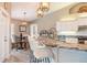 Stylish kitchen boasts granite countertops, modern appliances, and a breakfast bar with seating at 8178 Arlewood Cir, Port Charlotte, FL 33981