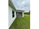 Enjoy the outdoors on the covered screened lanai overlooking a large grass backyard at 8917 Sawyer Cir, North Port, FL 34288