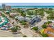 Aerial view showcasing the quaint commercial district, close proximity to the beach and nearby buildings at 915 Beach Rd # 215, Siesta Key, FL 34242