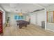 Community billiard room with a pool table, shelving, and comfortable seating at 915 Beach Rd # 215, Siesta Key, FL 34242