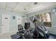 Well-equipped fitness center with exercise bikes, treadmills, and weight machines for resident use at 915 Beach Rd # 215, Siesta Key, FL 34242