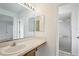 This bathroom features a shower with glass door and separate room for the toilet for added privacy at 5260 Jessamine Ave, North Port, FL 34291