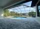 Screened pool and patio area at 124 Hercules Dr, Rotonda West, FL 33947