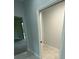 Hallway with access to storage and other rooms at 124 Hercules Dr, Rotonda West, FL 33947