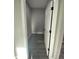 Small storage room with gray flooring and white door at 124 Hercules Dr, Rotonda West, FL 33947