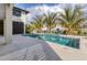 This backyard includes a private pool surrounded by lush landscaping, providing a serene oasis at 10009 Gasparilla Pass Blvd, Boca Grande, FL 33921