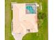 Top-down view of a house with a pool and tile roof at 256 Coblentz St, Port Charlotte, FL 33954