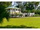 Charming waterfront cottage with lush landscaping and private walkway at 11000 Placida Rd # 1801, Placida, FL 33946