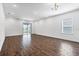 Bright and airy living room with sliding doors to patio at 16824 Canopy Garden Dr, Port Charlotte, FL 33953