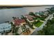 Waterfront home with landscaped yard at 8035 Manasota Key Rd, Englewood, FL 34223