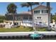 Backyard with pool, patio, and water access. Kayaks are also present at 8035 Manasota Key Rd, Englewood, FL 34223