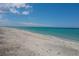 Scenic beachfront view with tranquil waves at 8035 Manasota Key Rd, Englewood, FL 34223
