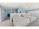 Main bedroom with twin beds and water views at 8035 Manasota Key Rd, Englewood, FL 34223
