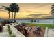 Relaxing waterfront fire pit area, perfect for enjoying sunsets and evenings at 8035 Manasota Key Rd, Englewood, FL 34223