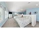 Spacious guest bedroom with two beds and water views at 8035 Manasota Key Rd, Englewood, FL 34223