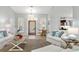 Spacious living area featuring a neutral color palette and ample natural light at 8035 Manasota Key Rd, Englewood, FL 34223